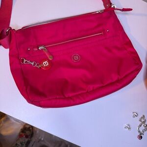 Vibrant Pink Crossbody Bag with Logo Charm